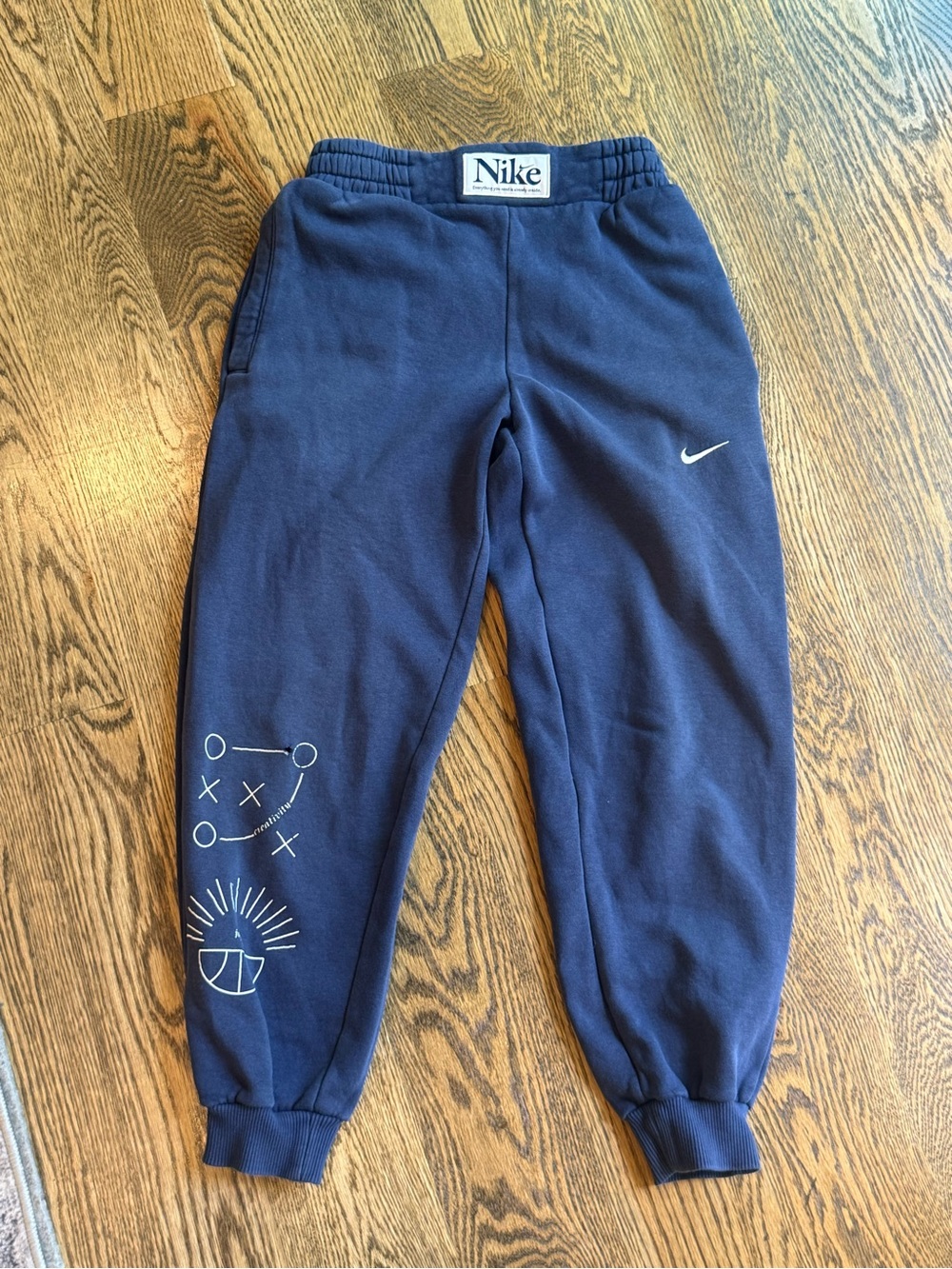 Nike Boys Navy Sweatpants with White Graphic Accents